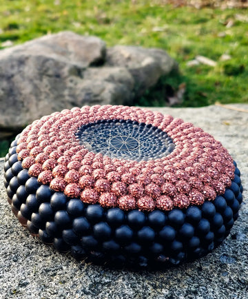 orgonite on a rock