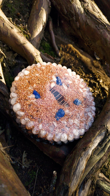 orgonite next to a tree